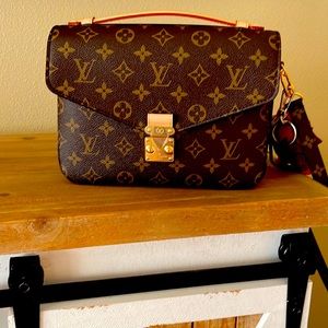 Louis Vuitton Brand New comes with bar code receipt dust bag and box